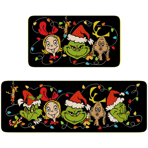 Two Christmas-themed car window stickers featuring cartoon characters with lights and Santa hats on a black background.