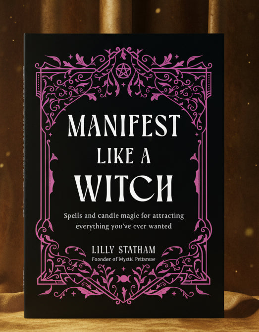 Book cover of 'Manifest Like a Witch' with decorative purple border on black background