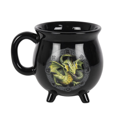 Black mug with a dragon design on a white background