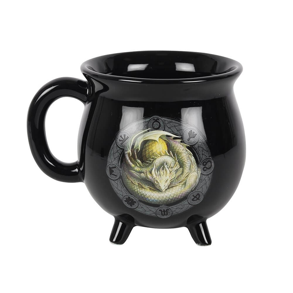 Black mug with a dragon design on a white background