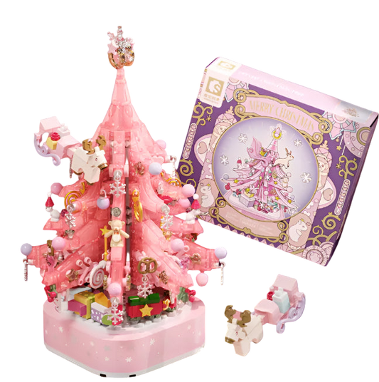 Pink Christmas tree decoration with packaging on a pink background