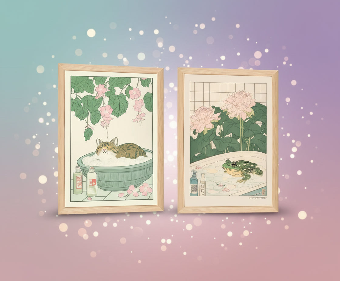 Two framed illustrations of a cat and a frog in a bath with flowers and bottles.