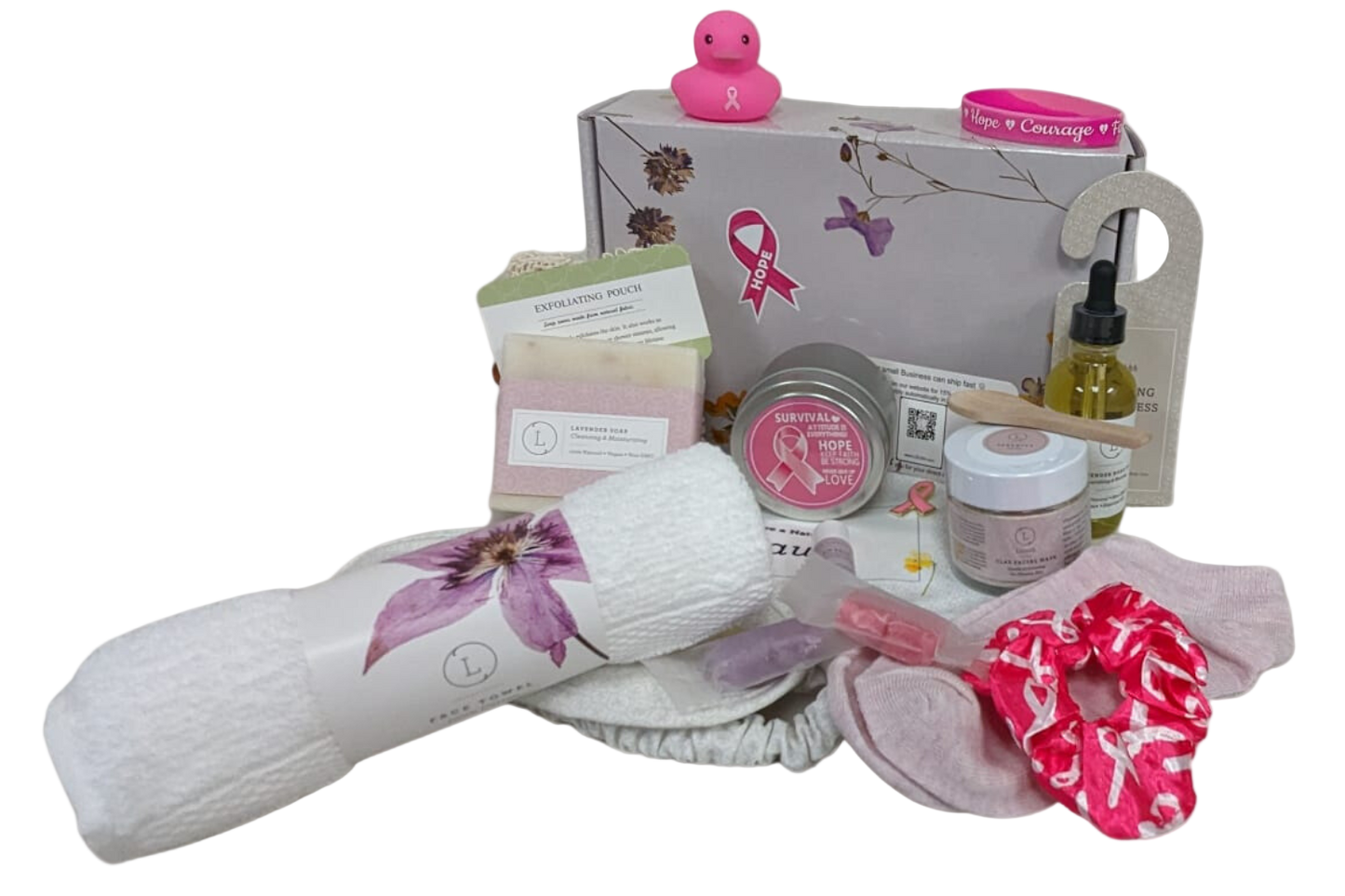 Collection of beauty and self-care products including a bath bomb, soap, and towels on a white background.