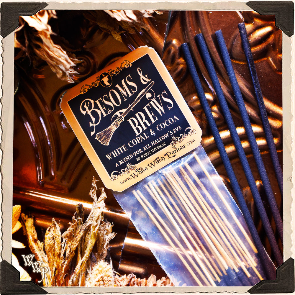 Incense sticks with a label reading 'Besoms & Brews' on a decorative background.