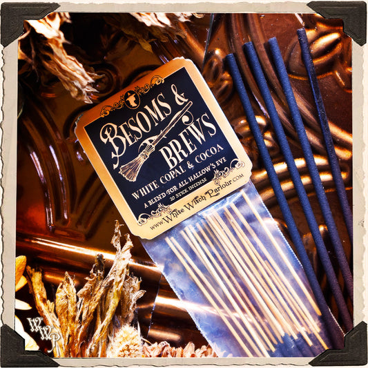 Incense sticks with a label reading 'Besoms & Brews' on a decorative background.