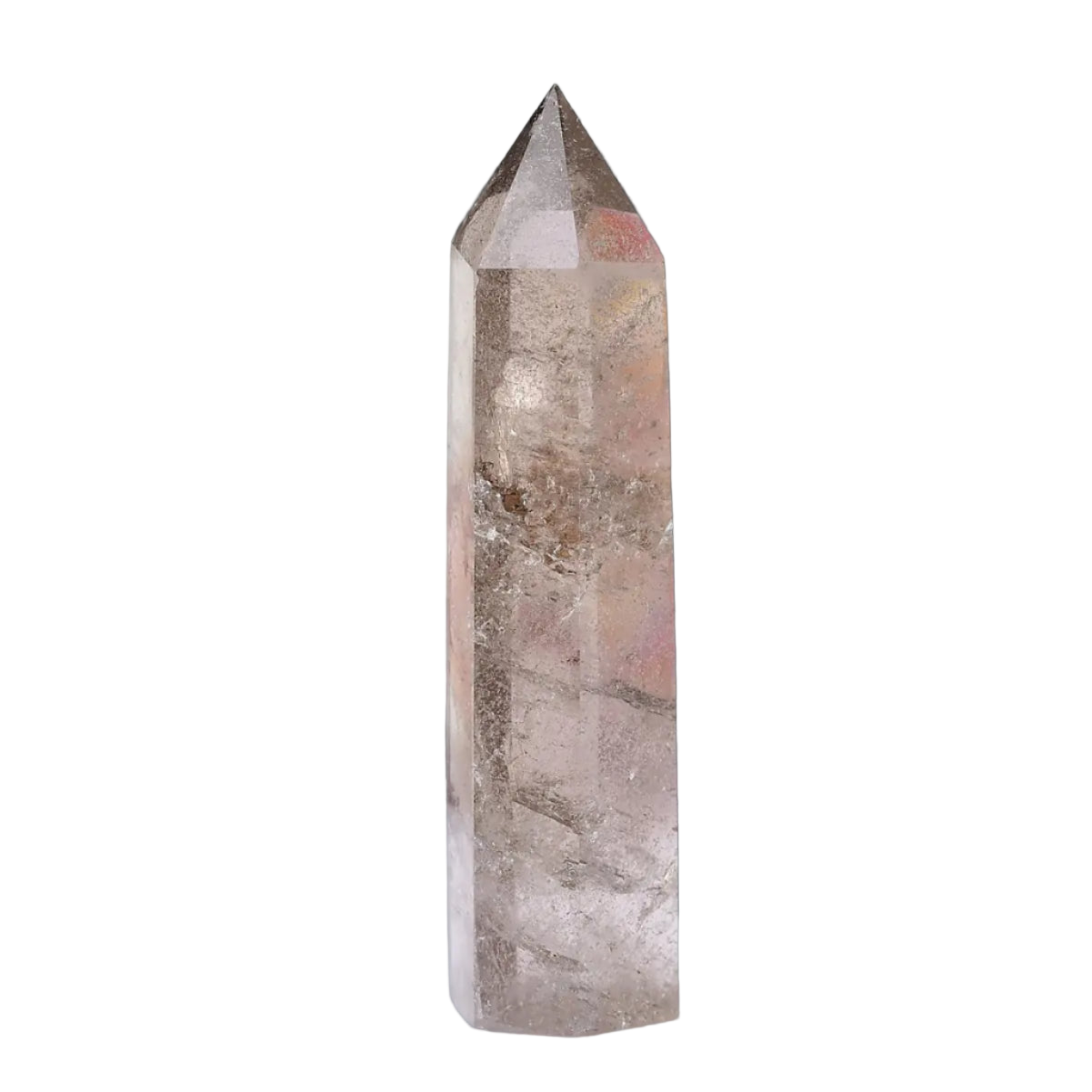 Crystal tower on a white surface with a blurred background
