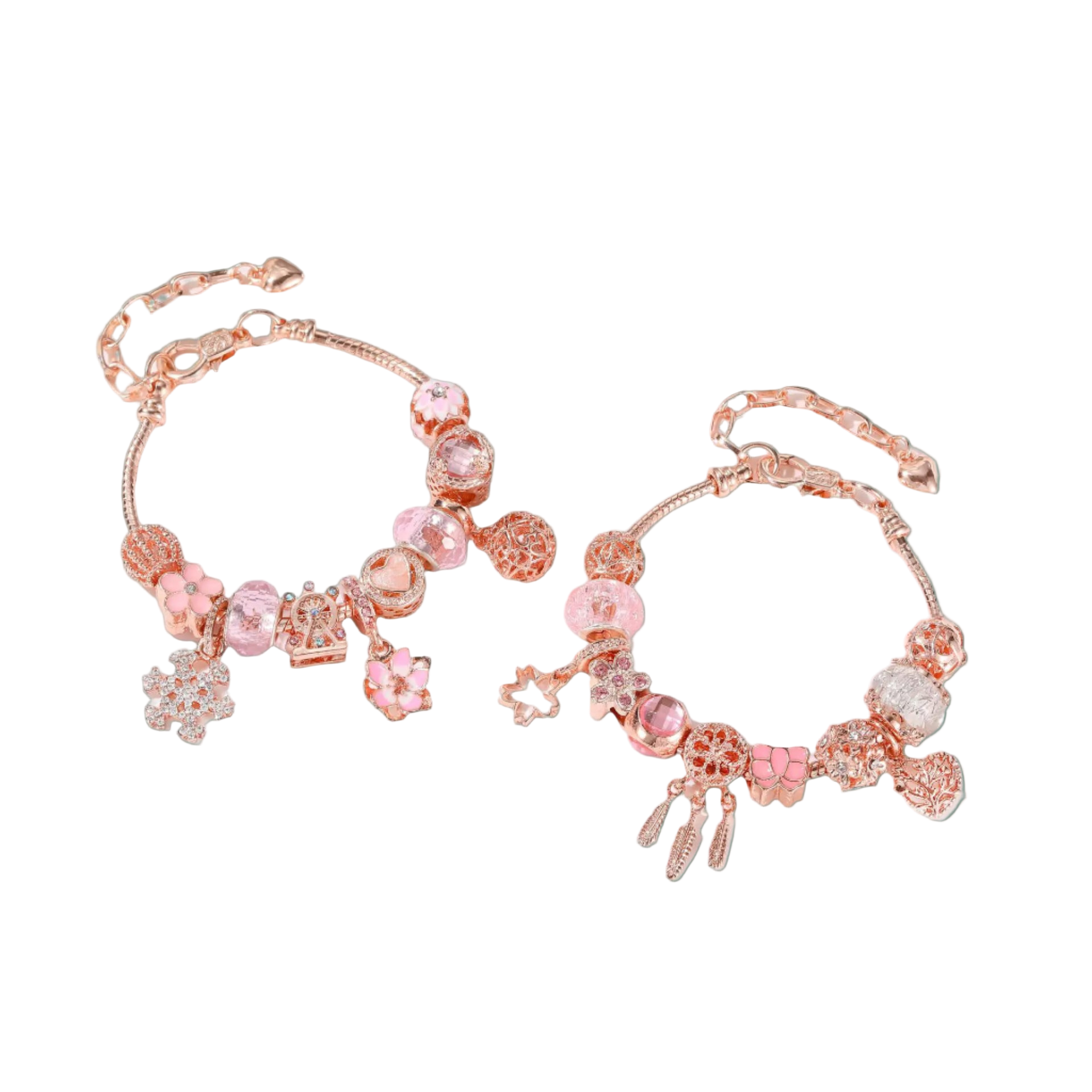 Pair of rose gold bracelets with pink beads and charms on a light background