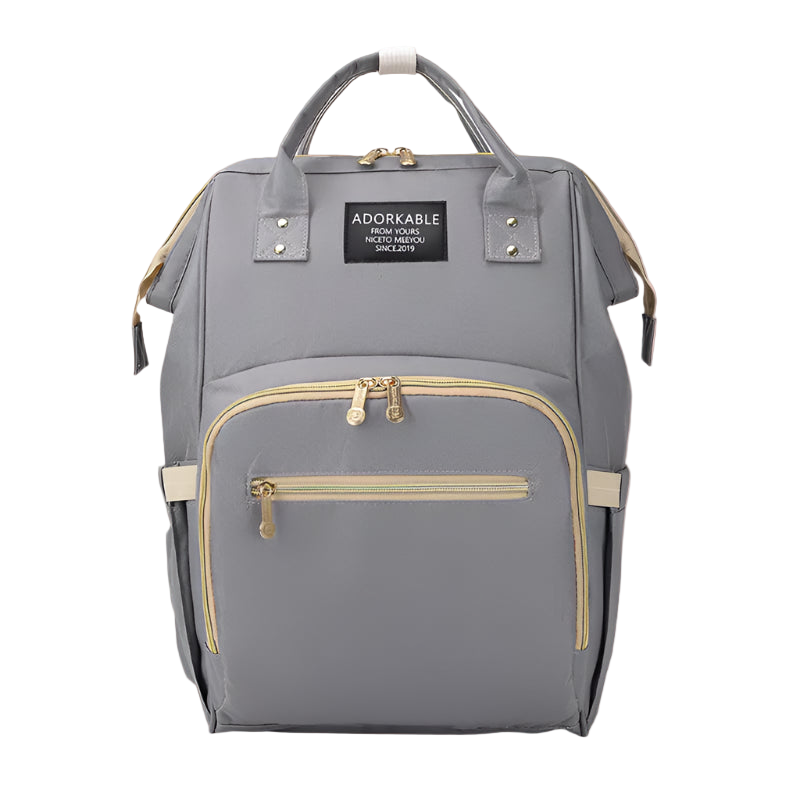 Gray backpack with gold zippers and 'Adorkable' brand label on a white background