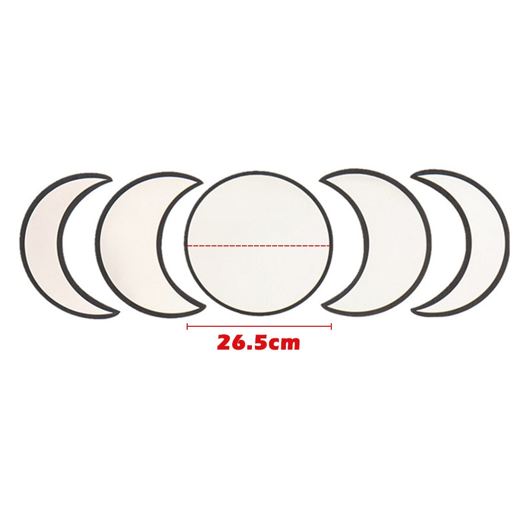 Set of circular lenses with a measurement of 26.5cm on a white background