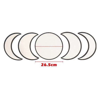 Set of circular lenses with a measurement of 26.5cm on a white background