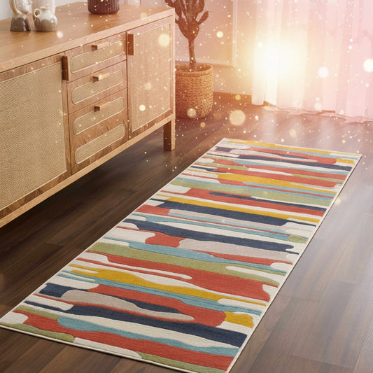 Colorful striped rug on a wooden floor in a room with a wooden sideboard.