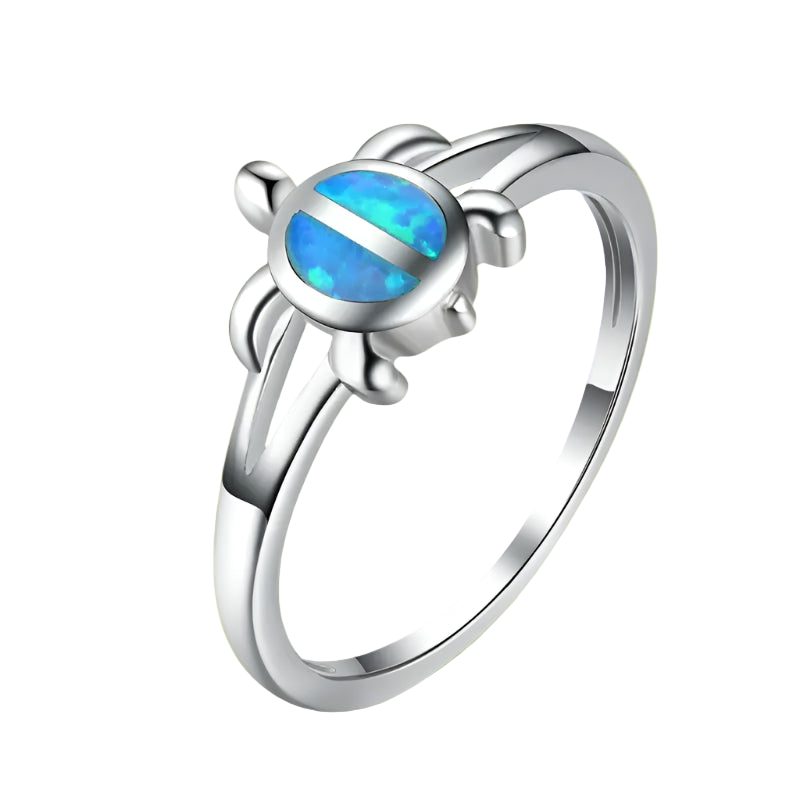 Silver ring with a blue opal stone on a white background