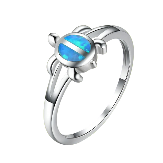 Silver ring with a blue opal stone on a white background
