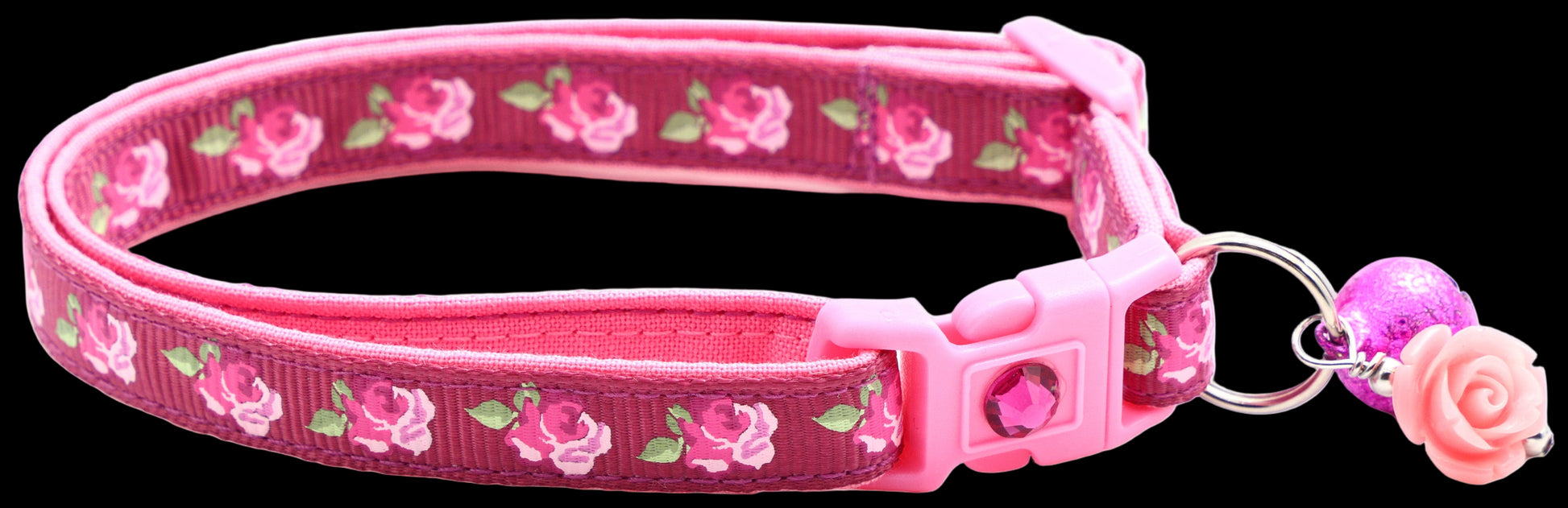 Pink floral dog collar with a matching tag on a white background