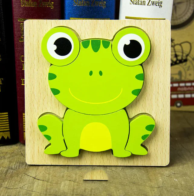 Wooden frog puzzle on a wooden surface with books in the background