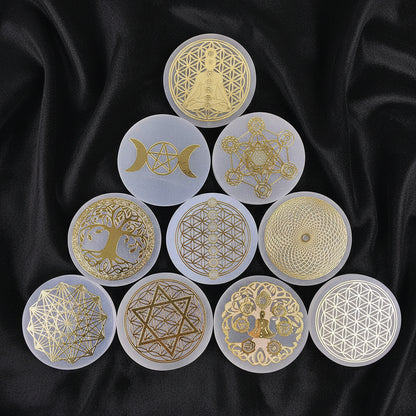 Set of gold and white circular designs on a blue fabric background
