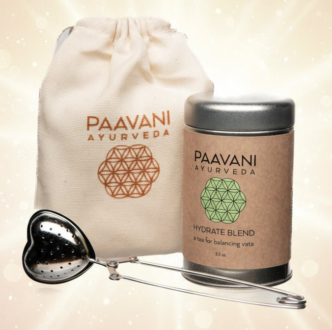 Paavani Ayurveda product with a metal scoop on a white background