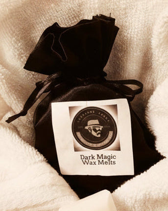 Box of Dark Magic Wax Melts on a textured white surface