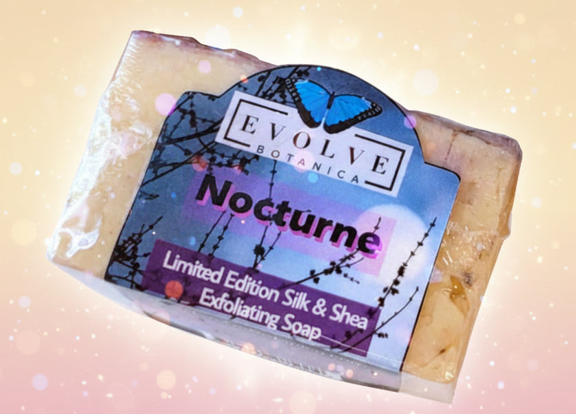 Bar of soap with 'Evolve Botanica' packaging on a white background