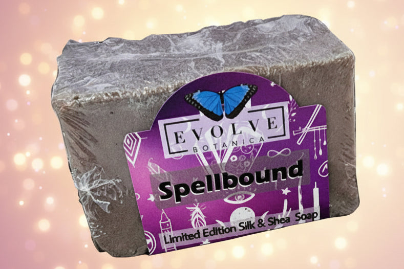 Bar of soap with a purple label featuring the brand 'Evolve Botanics' on a white background.