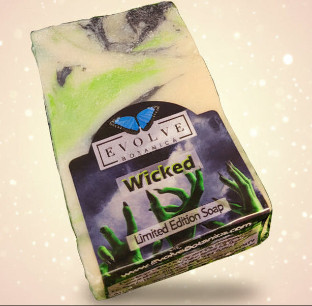 Bar of soap with a 'Wicked' label and 'Evolve Botanics' branding on a white background