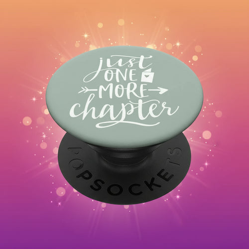 PopSockets grip with 'Just One More Chapter' text on a light green background