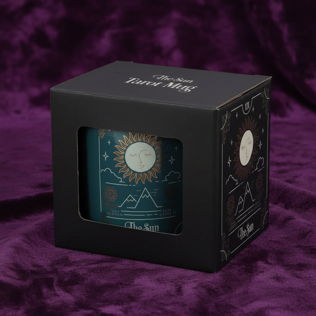 Mug with 'The Sun' design in a black box packaging