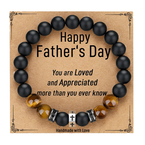 Black beaded bracelet with decorative elements on a 'Happy Father's Day' card.