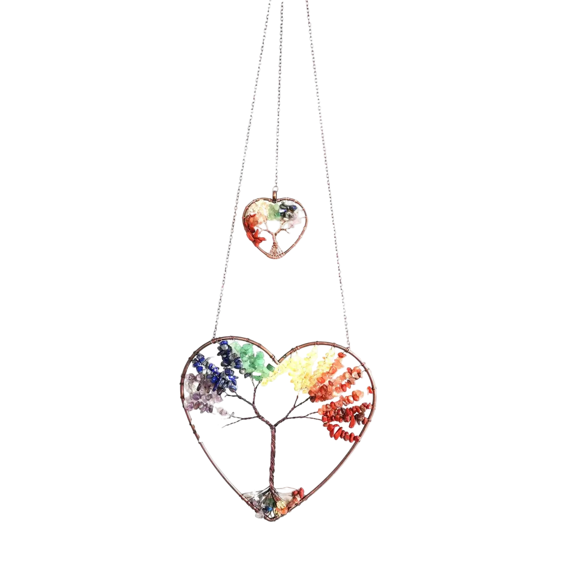 Heart-shaped necklace with a tree design and colorful leaves on a white background