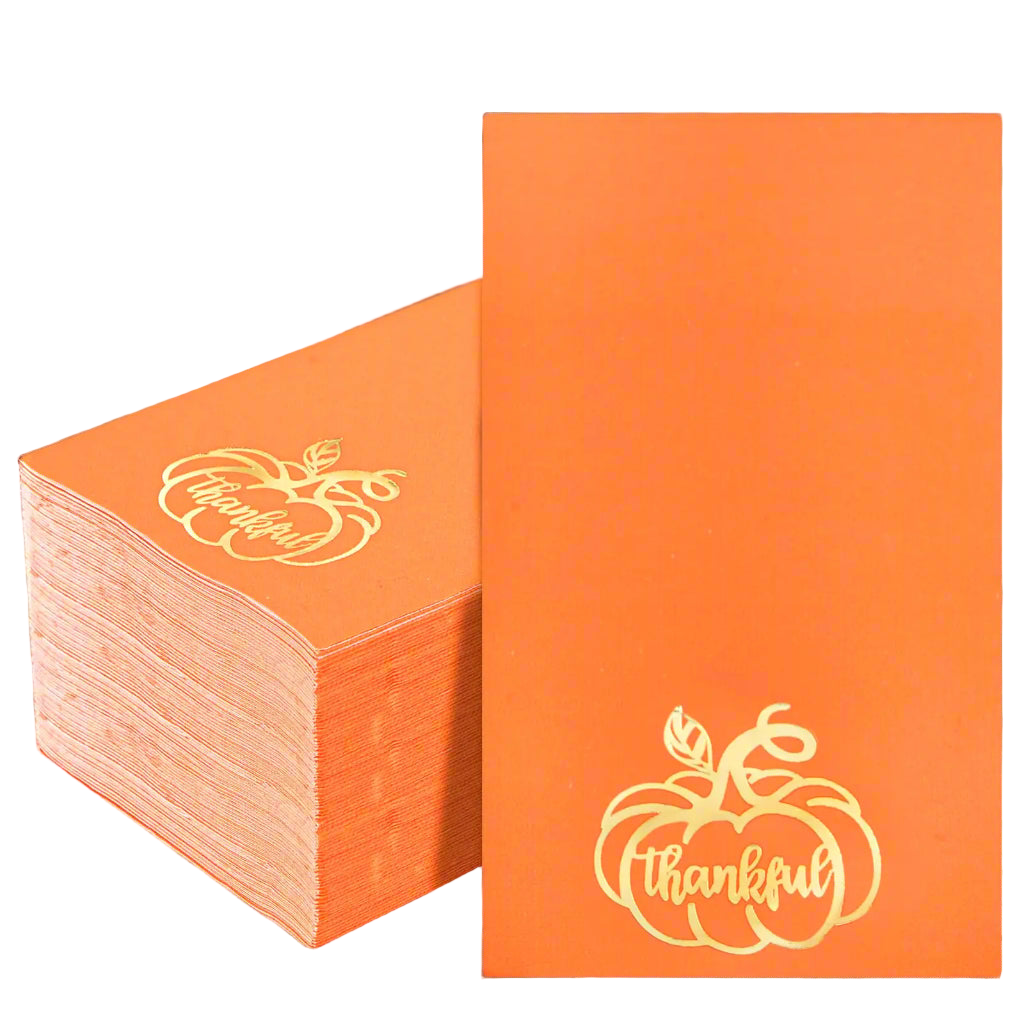 Stack of orange napkins with 'Thankful' design on a white background