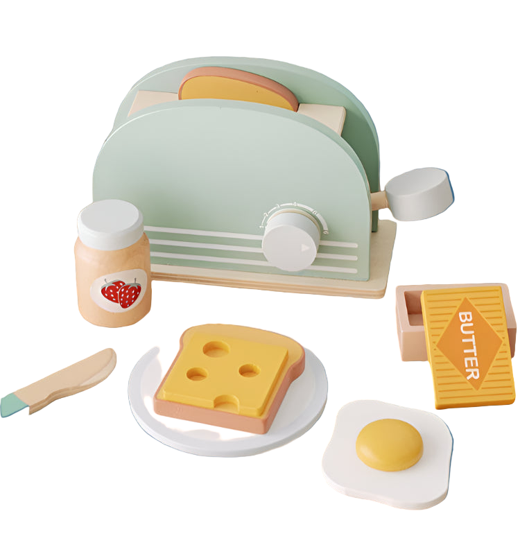 Children's simulated bread machine with toy food items on a wooden surface