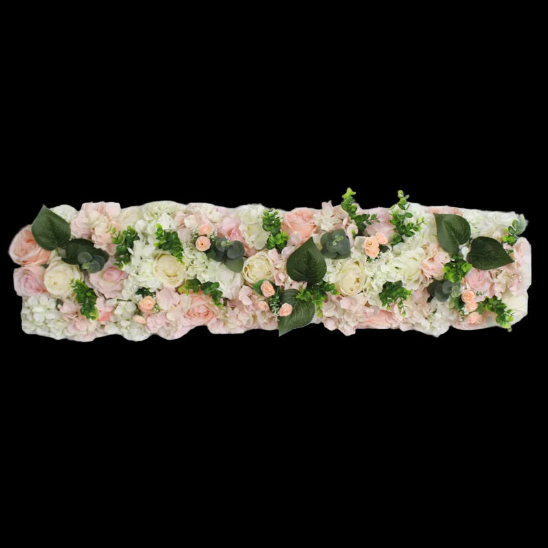 Floral arrangement with pink, white, and green flowers on a light gray background