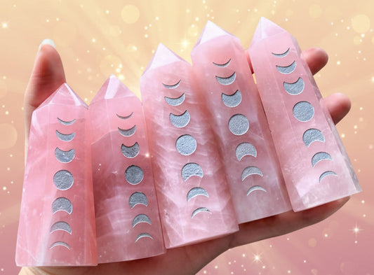 Pink silicone nail form with cut-out patterns held in front of green plants