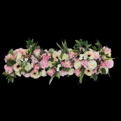 Floral arrangement with pink, white, and green flowers on a white background