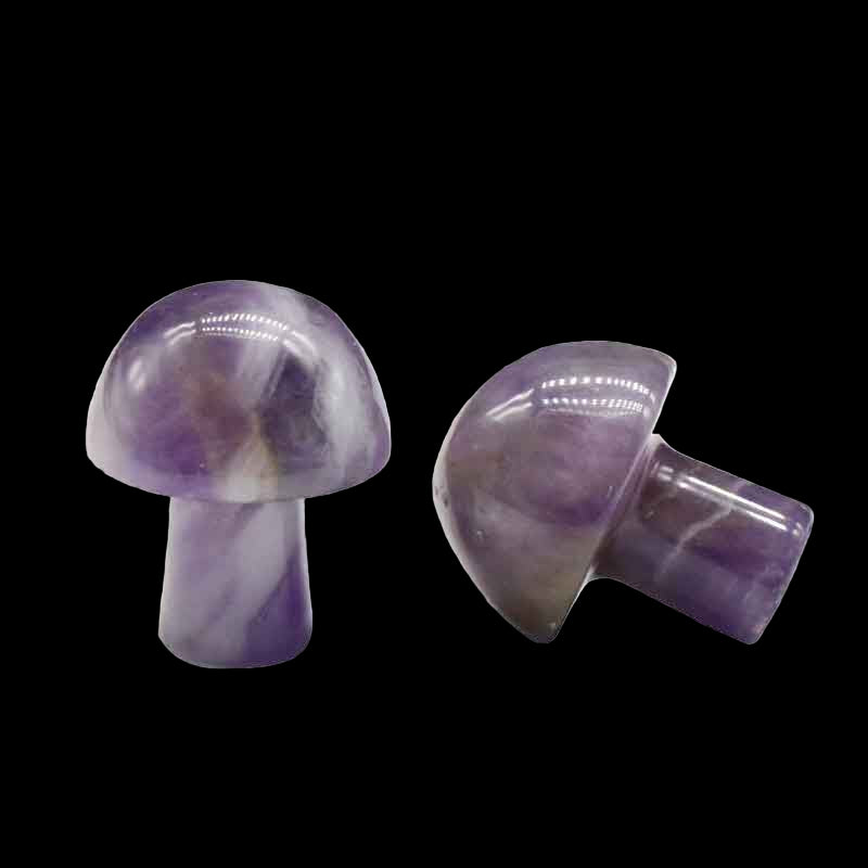 Purple stone mushroom-shaped objects on a white background