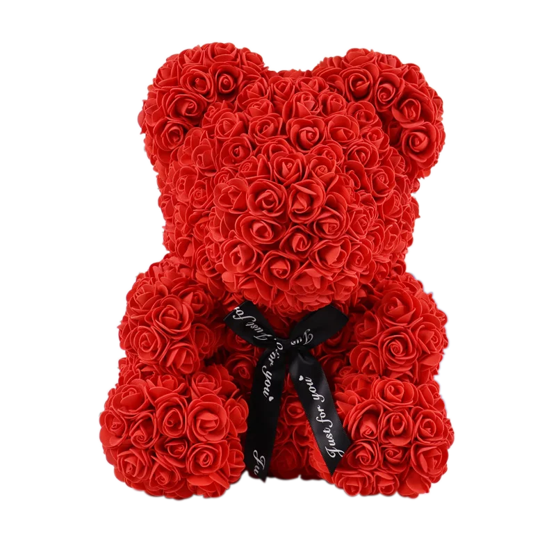 Red rose teddy bear with a black ribbon on a white background