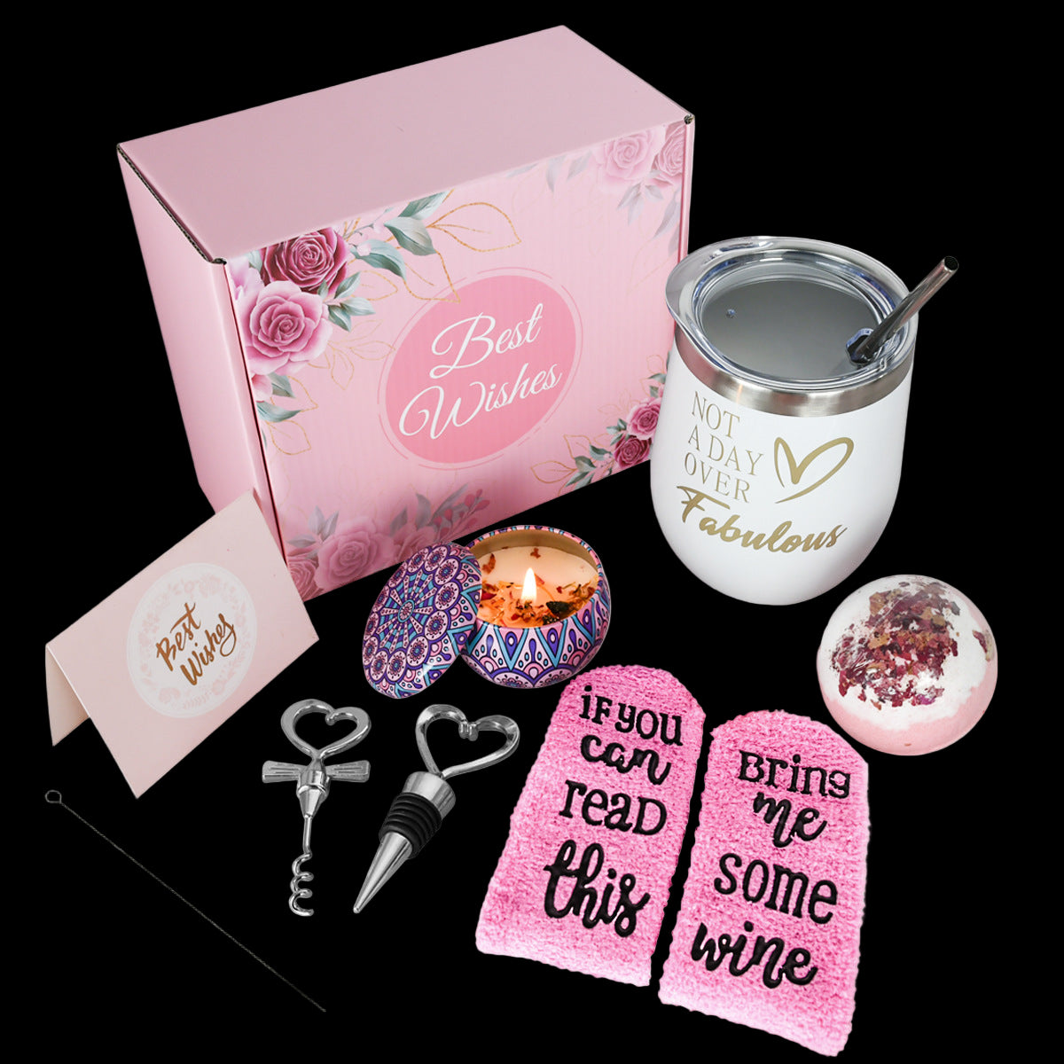 Gift set with pink box, tumblers, and decorative items on a white background