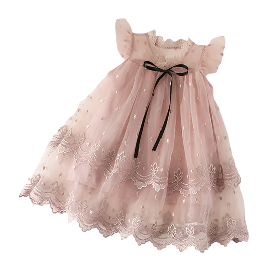 Pink lace dress with a black ribbon on a white surface