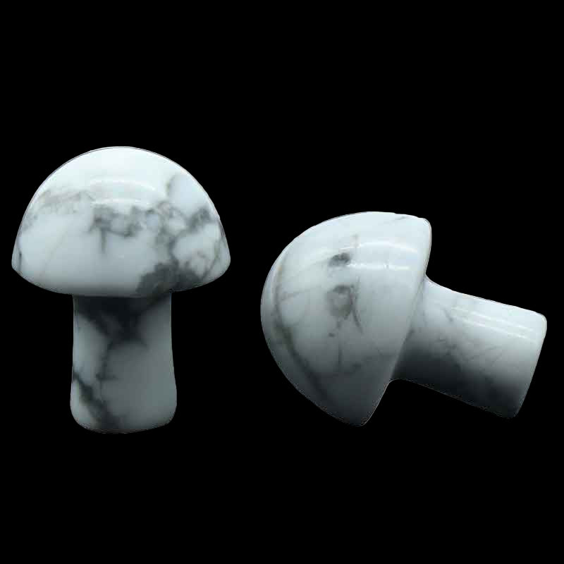 Marble-patterned mushroom-shaped objects on a white background