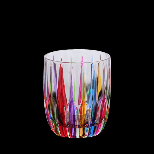 Multicolored glass tumbler on a white background