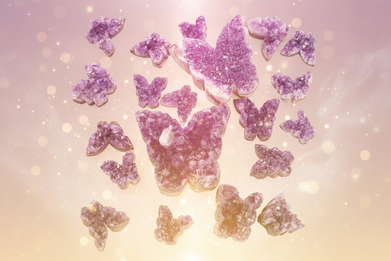 Collection of purple crystal clusters on a white background