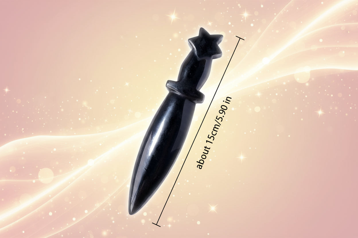 Black crystal dagger with measurements on a light gray background