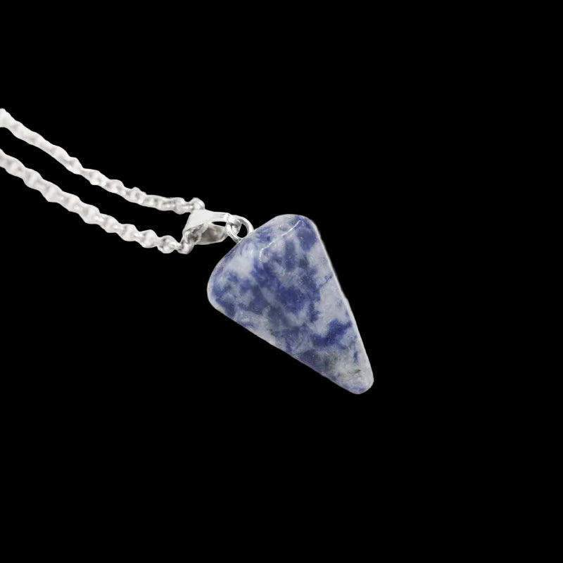 Blue stone pendant on a silver chain against a white background