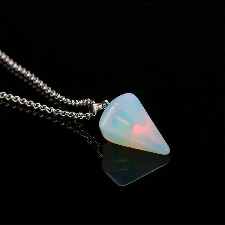 Necklace with a triangular opal pendant on a black background