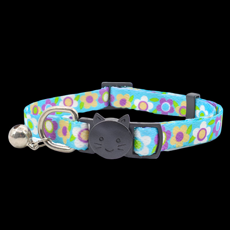 Cat collar with floral pattern and bell on a white background