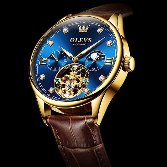 Luxury watch with blue face and gold accents on a dark background, featuring the OLEVS brand.
