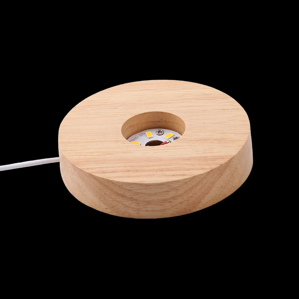 Wooden spool with LED light on a white background