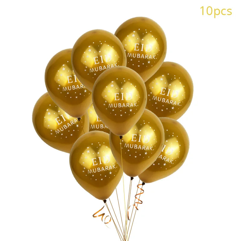 Gold balloons with 'El Mubarak' text on a white background
