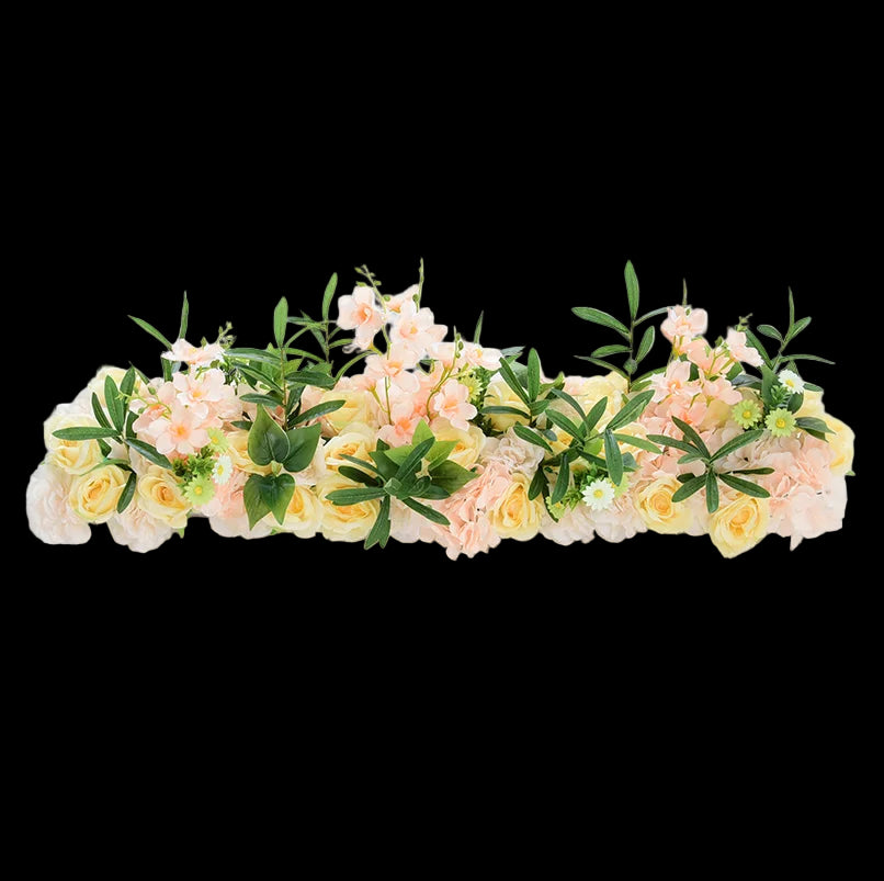 Floral arrangement with pink, yellow, and green flowers on a white background