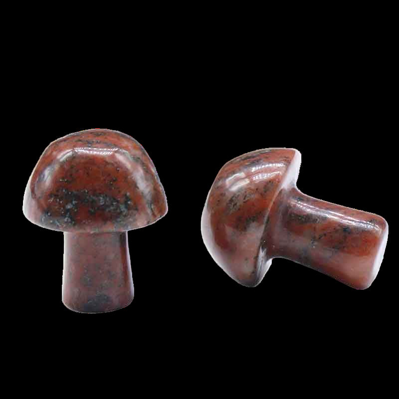 Two brown stone mushroom-shaped objects on a white background